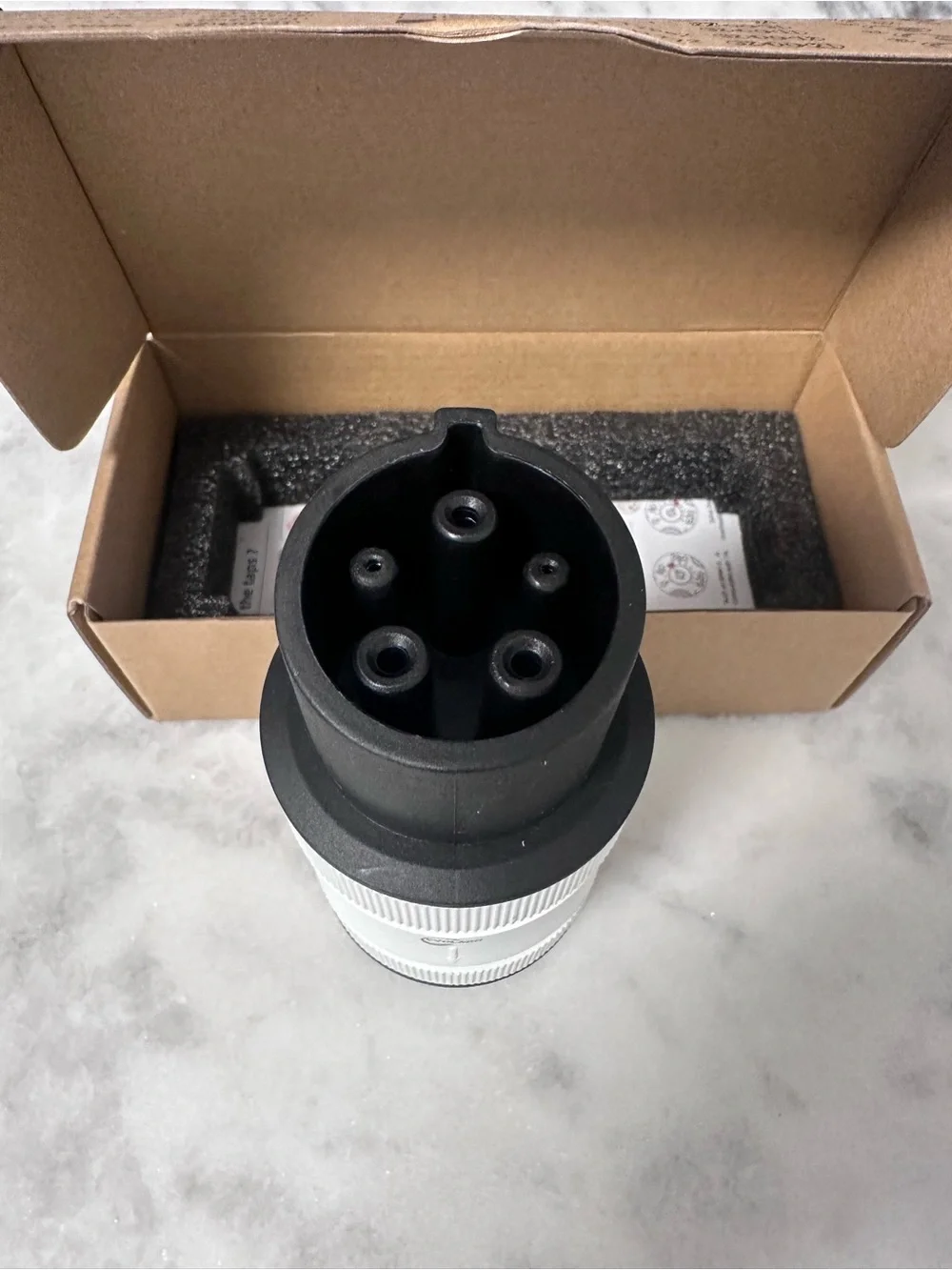 Source Unknown White and Black EV Charging Adapter Connector
